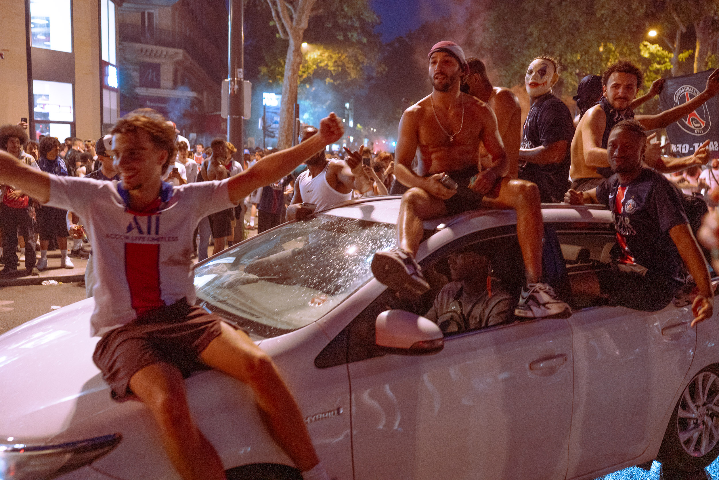 PSG supporters celebrating the UEFA Champions League win in Paris, June 2026.